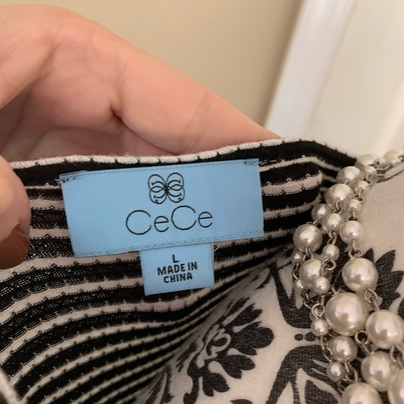 CeCe, Women’s black & white flair too/ long sleeves. Size Lg. - Picture 8 of 11